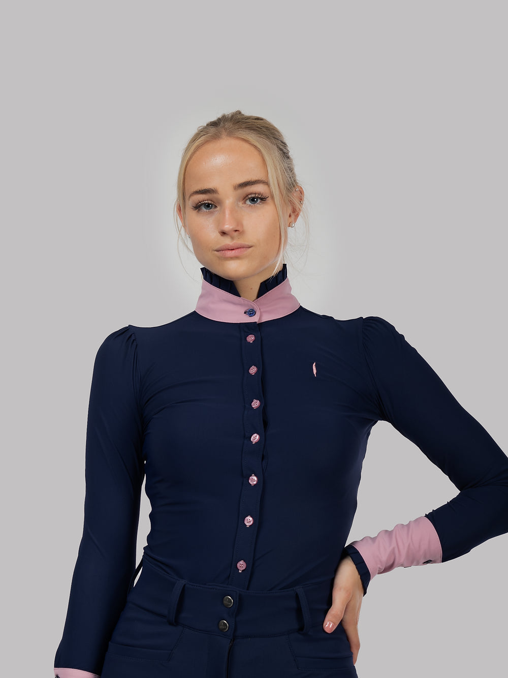 Ruffle Long Sleeve Button up top in Navy with Pink detail