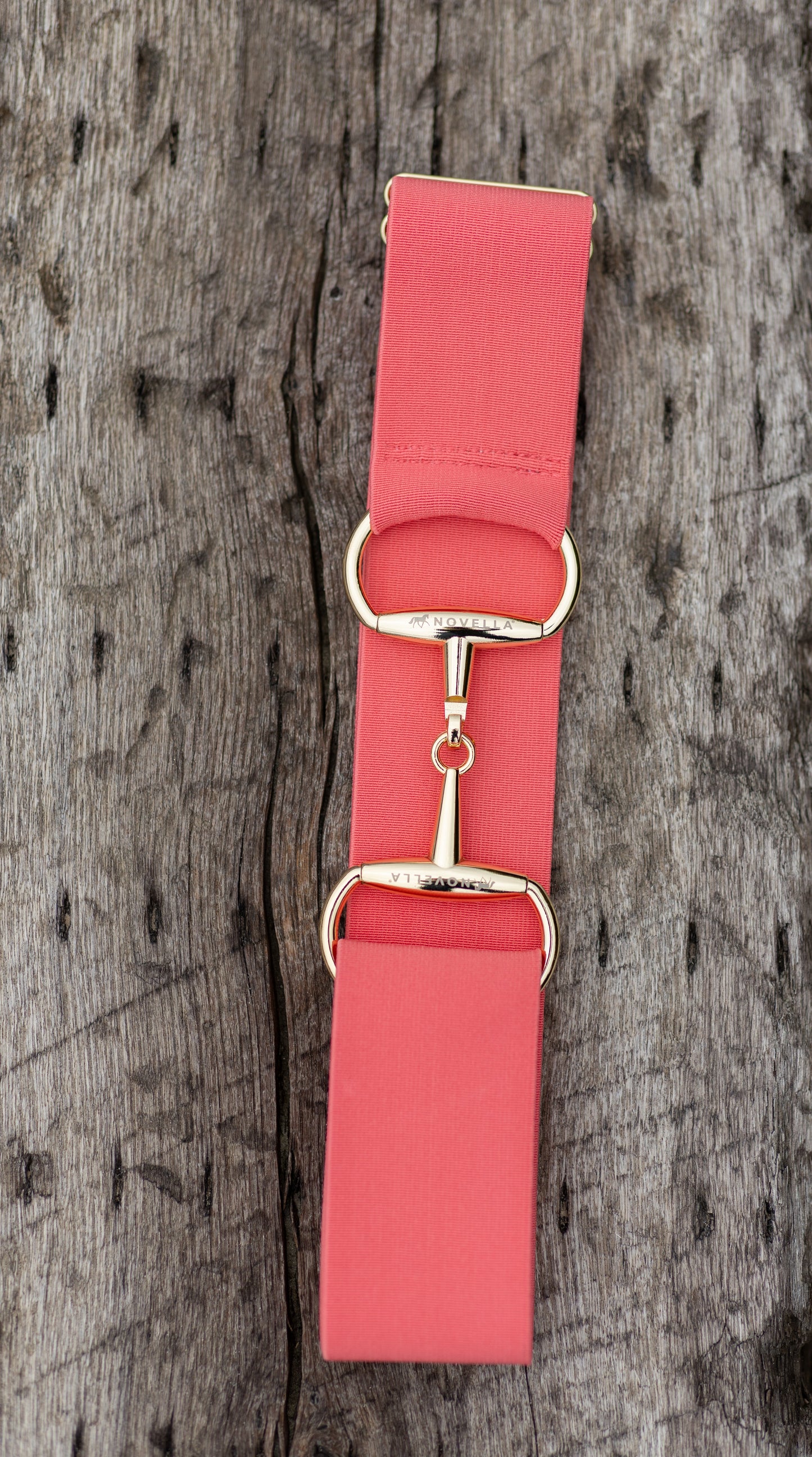 The Novella Snaffle Belt in Coral.